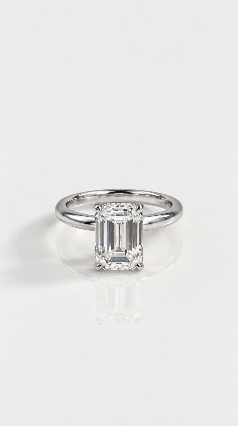 Emerald Cut Diamond Solitaire Engagement Ring – front view, 18ct white gold