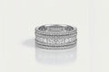 White Gold Channel Set Diamond Band with Round and Princess Cut Diamonds.