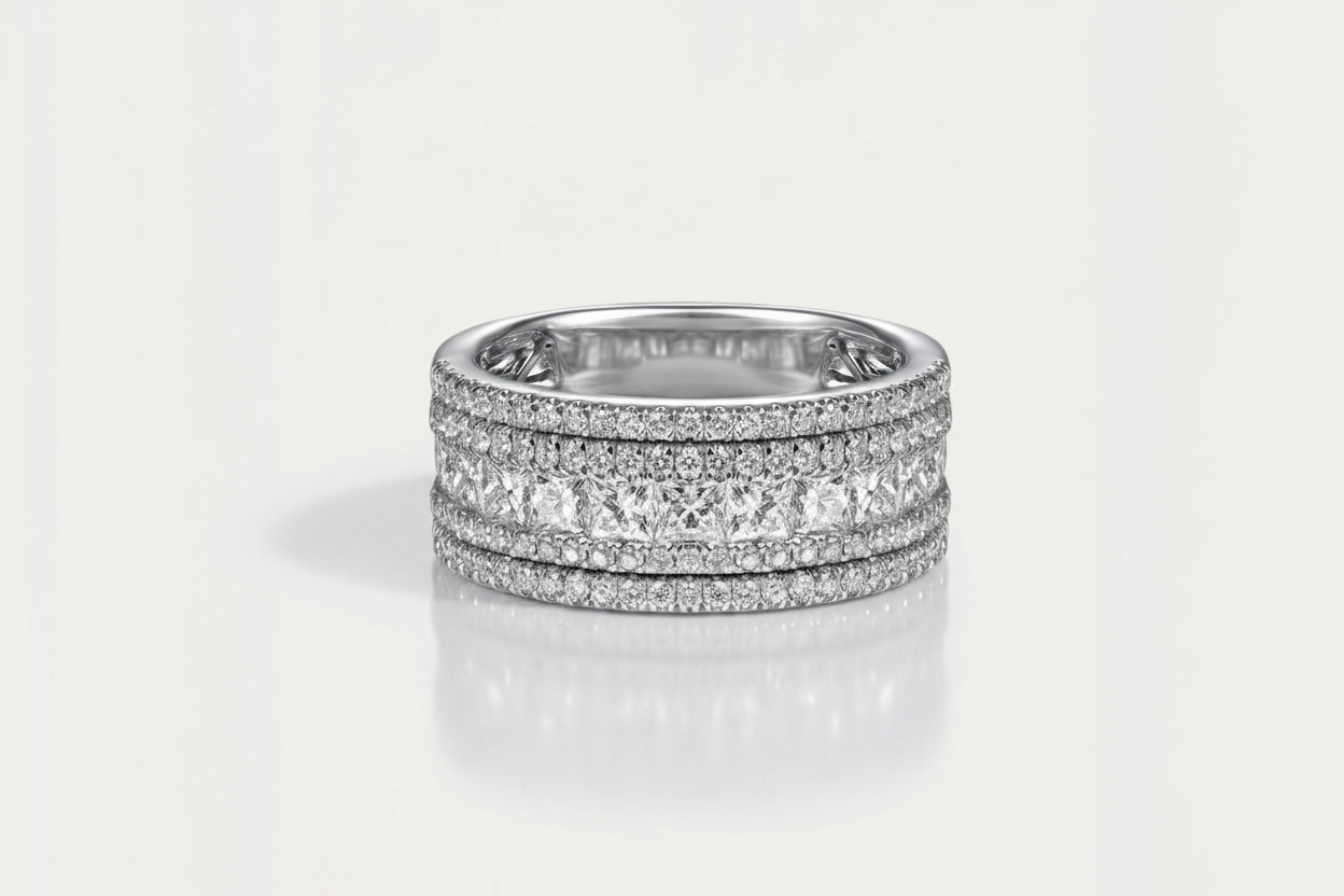 White Gold Channel Set Diamond Band with Round and Princess Cut Diamonds.