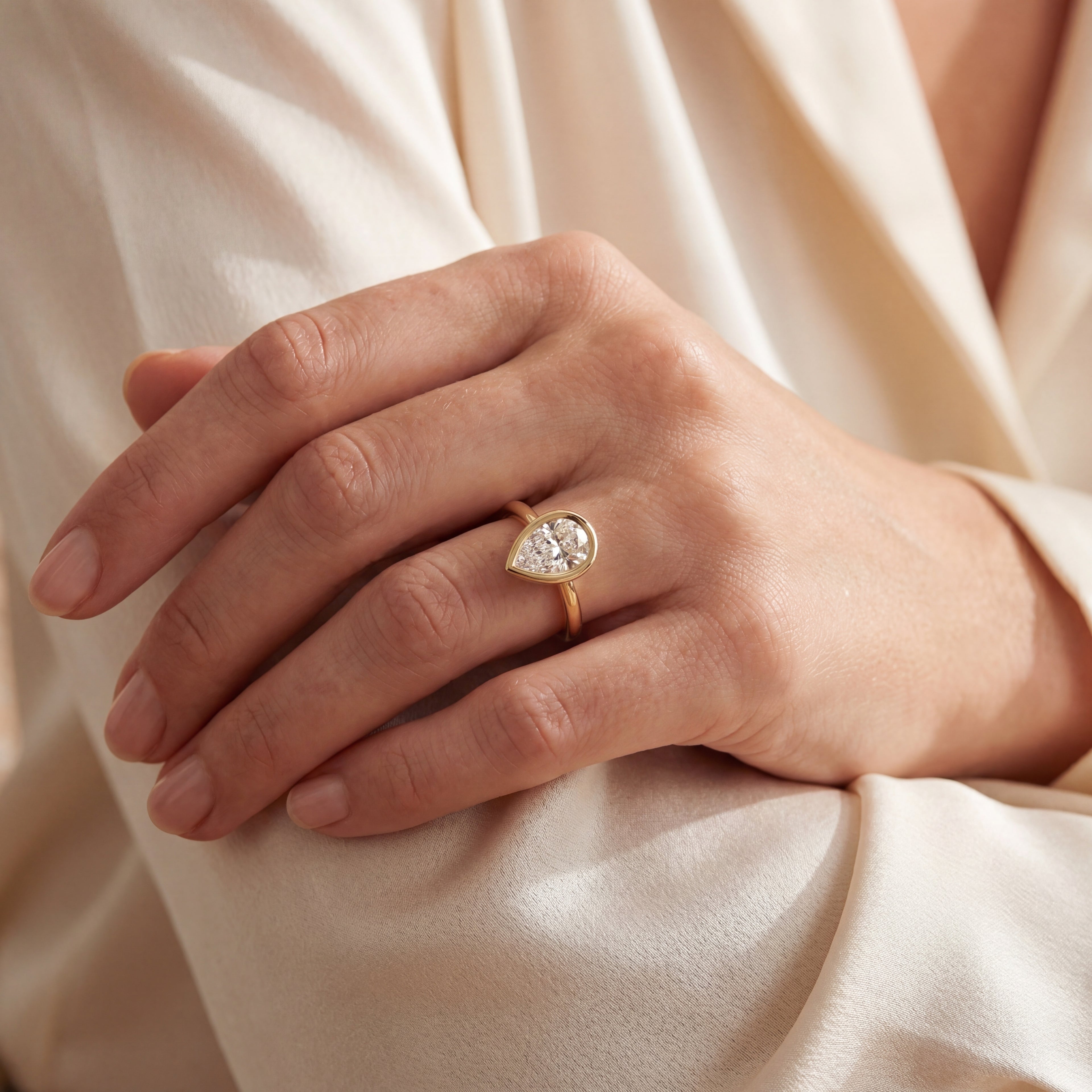 Levendi Wave of Love - Pear Cut Bezel Set Engagement Ring