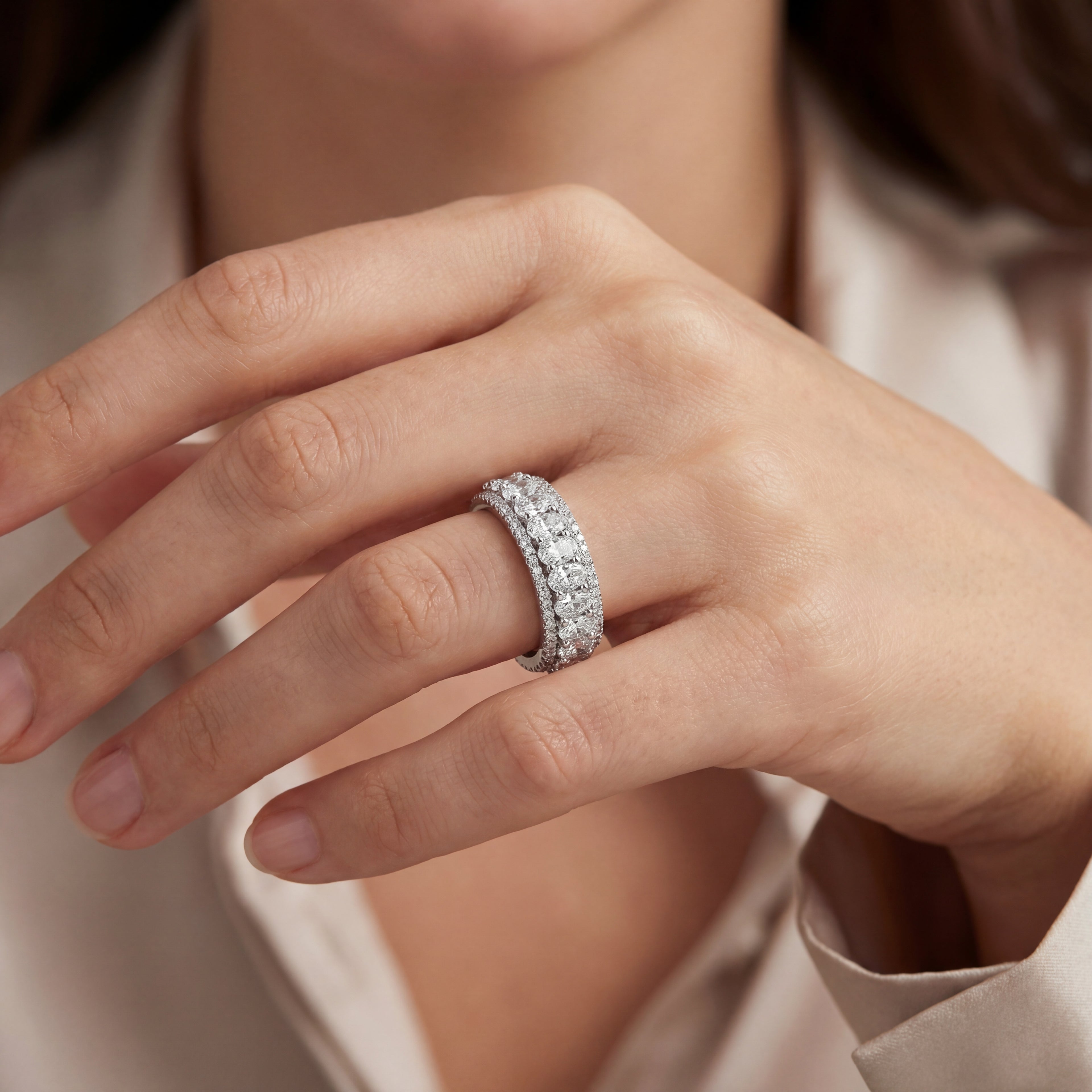 Wide White Gold Oval and Round Diamond.
