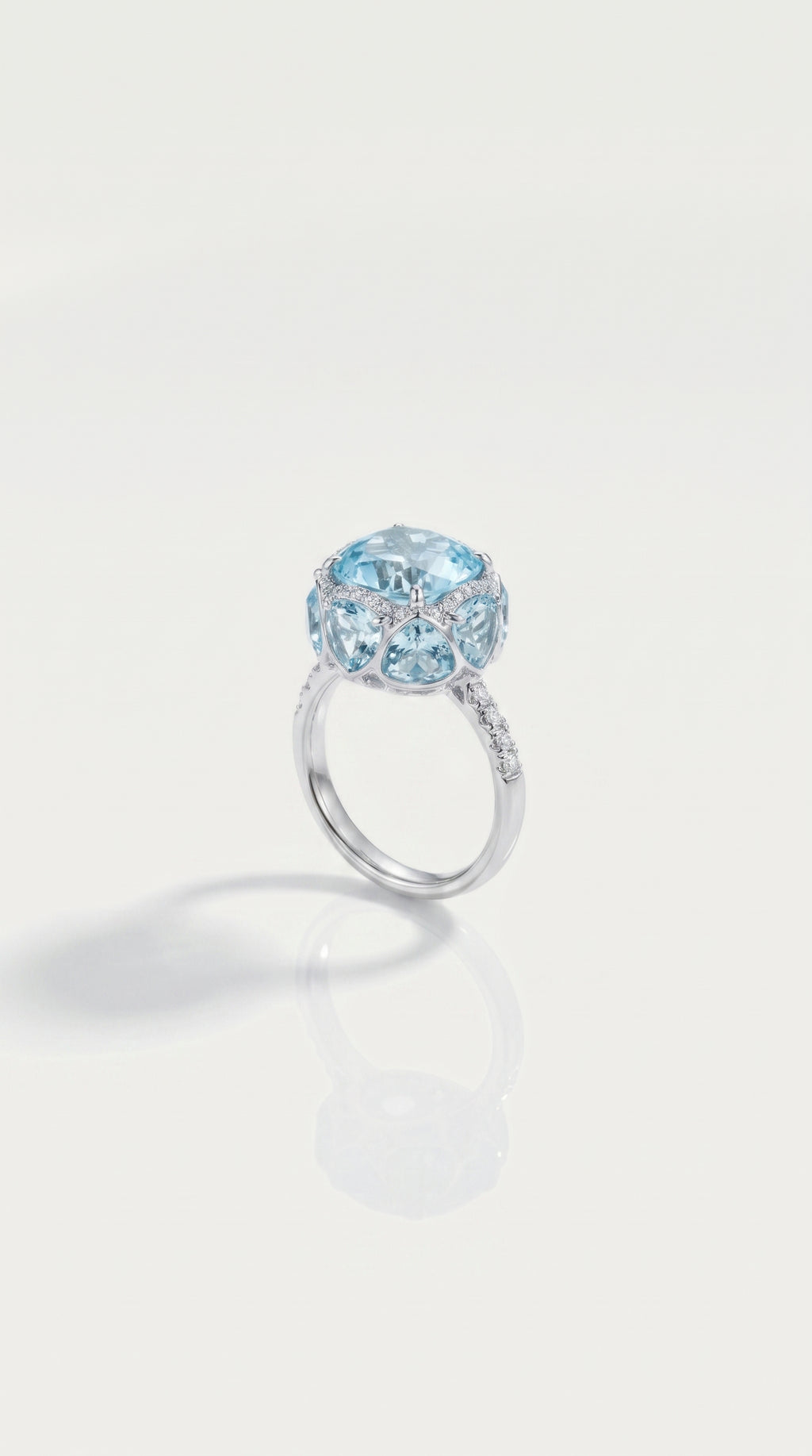 Sky Blue Topaz Hidden Halo 8 Topaz Trillion Cut & Diamond Ring, view 2 — Levendi Jewellers