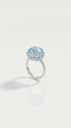 Sky Blue Topaz Hidden Halo 8 Topaz Trillion Cut & Diamond Ring, view 2 — Levendi Jewellers