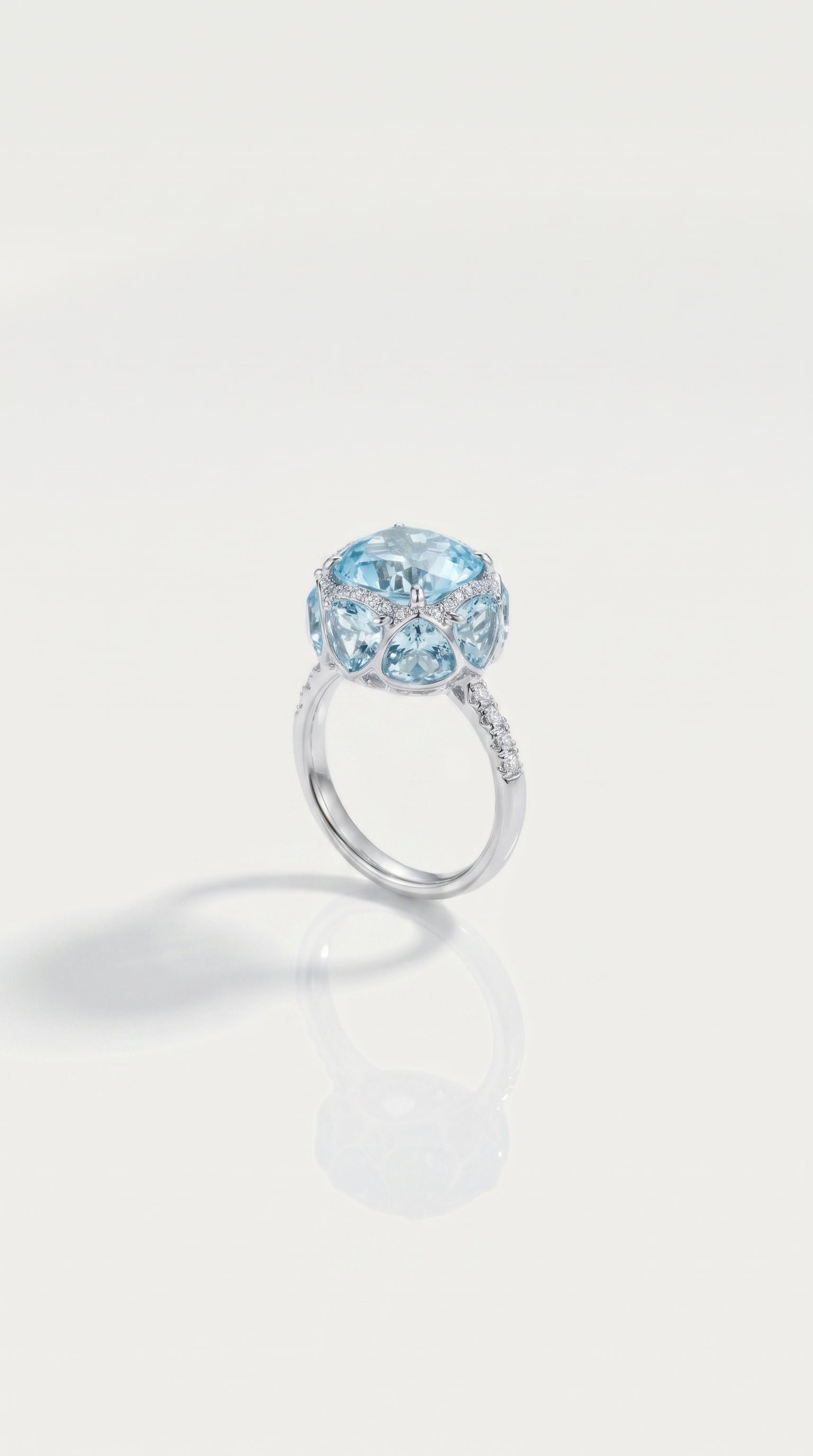 Sky Blue Topaz Hidden Halo 8 Topaz Trillion Cut & Diamond Ring