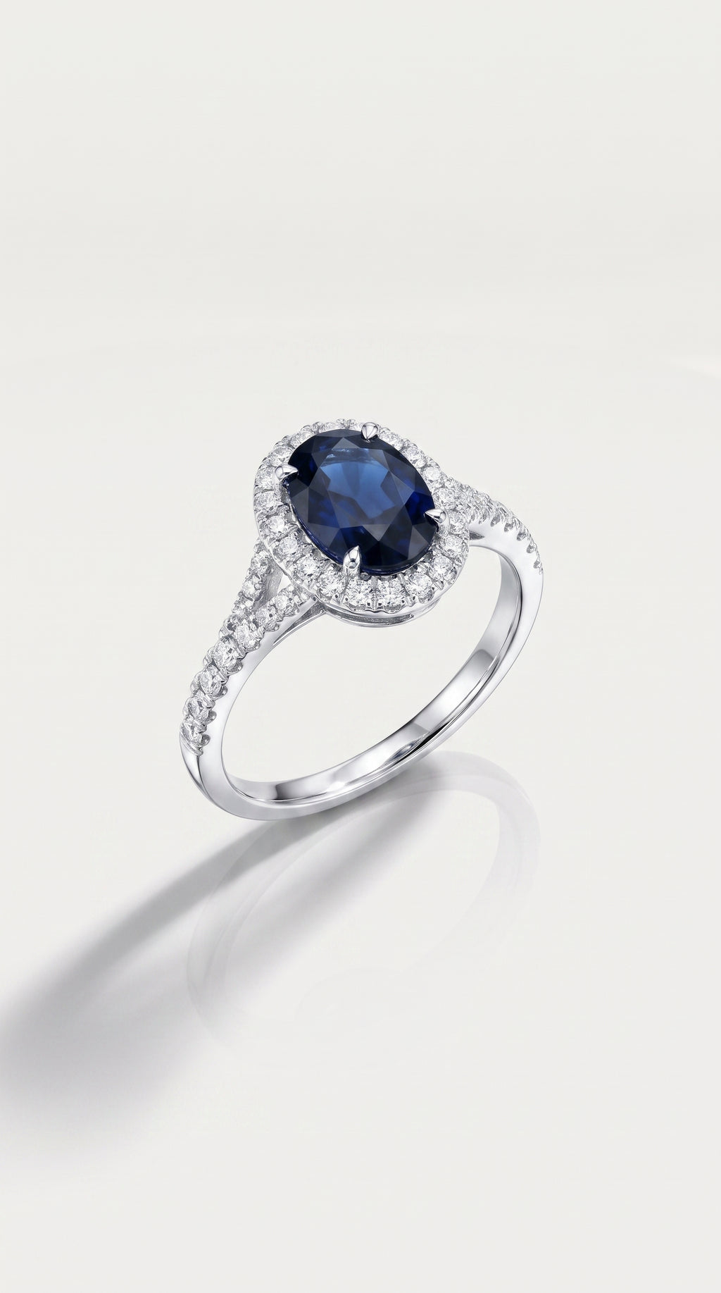 Oval Cut Australian Blue Sapphire 2.35ct Diamond Halo Ring, view 2 — Levendi Jewellers