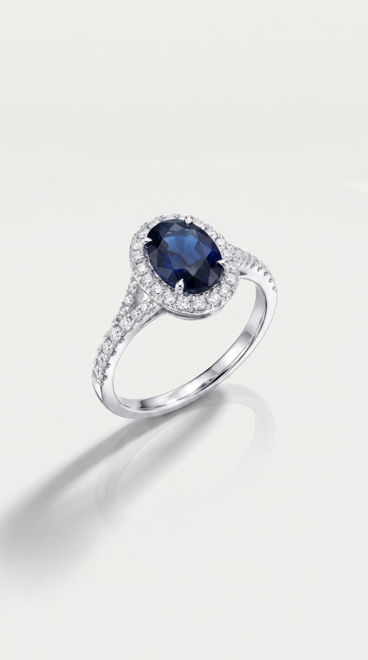 Oval Cut Australian Blue Sapphire 2.35ct Diamond Halo Ring, view 2 — Levendi Jewellers