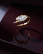 Levendi Wave of Love - Marquise Soft Curve Bezel — Levendi Jewellers, on burgundy stone