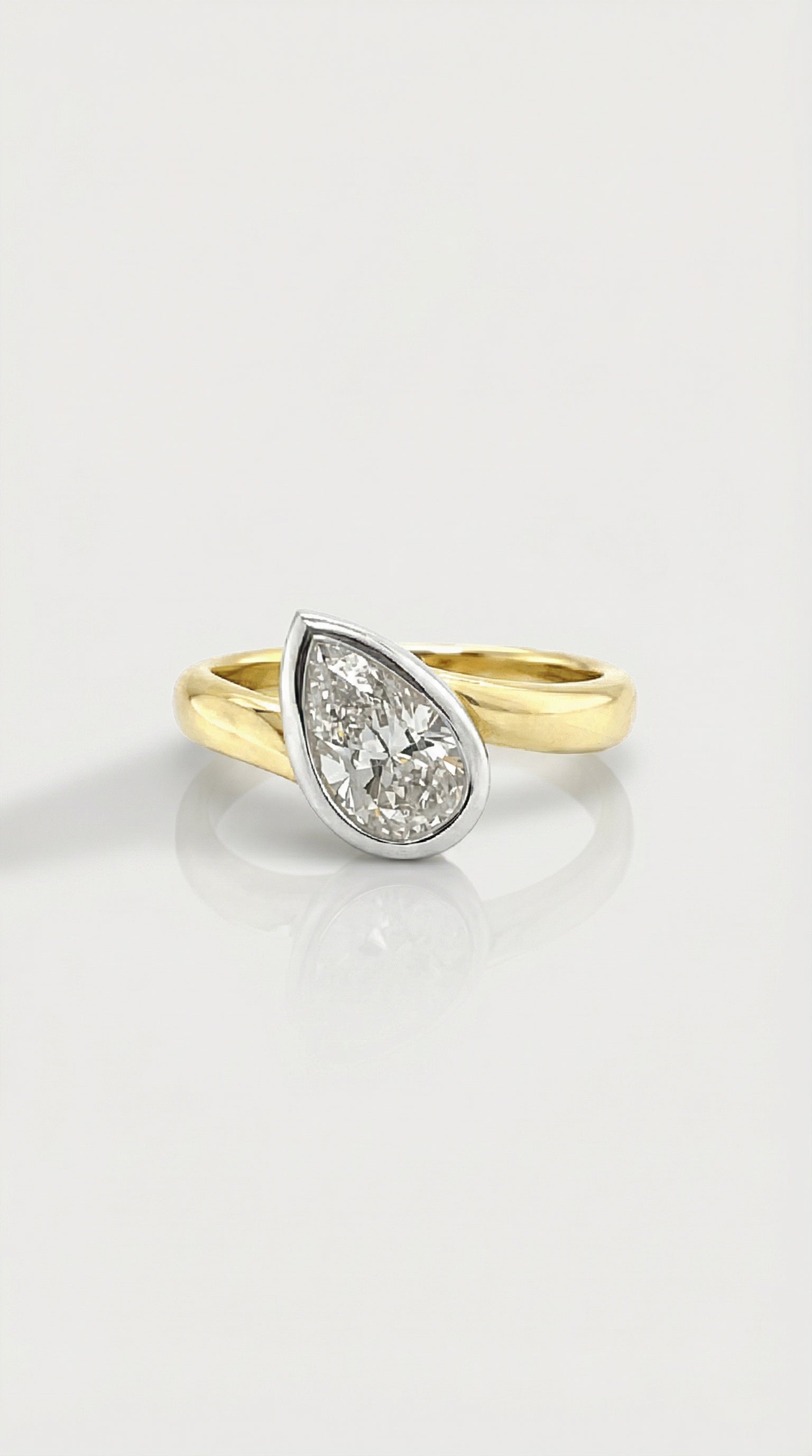 Levendi Signature- Pear Cut Twist Engagement Ring
