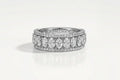 Wide White Gold Oval and Round Diamond.
