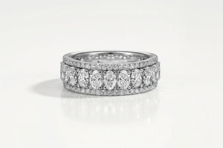 Wide White Gold Oval and Round Diamond.