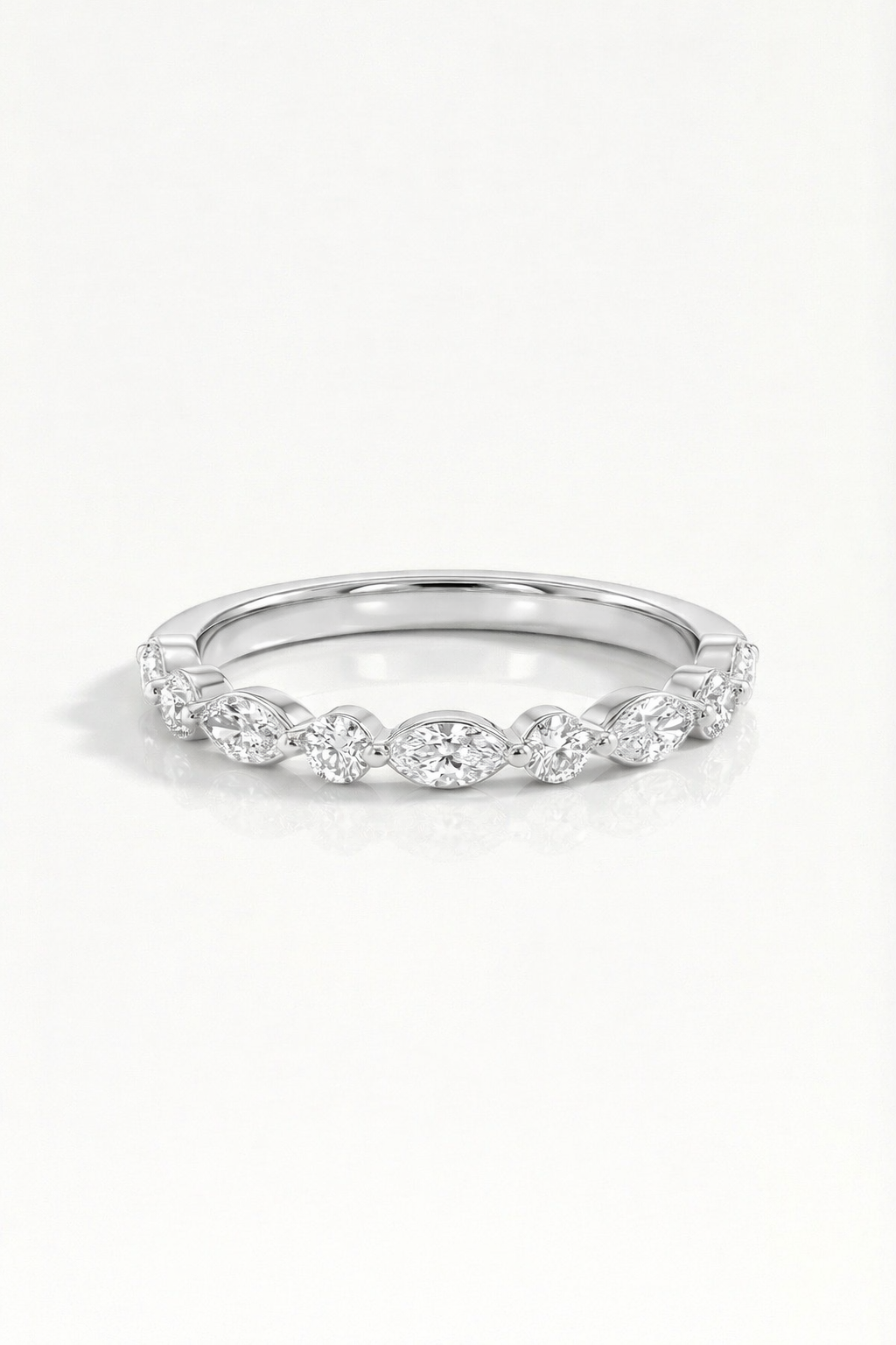 Wedding Band - Marquise and Round Diamonds Shared Claws — Levendi Jewellers