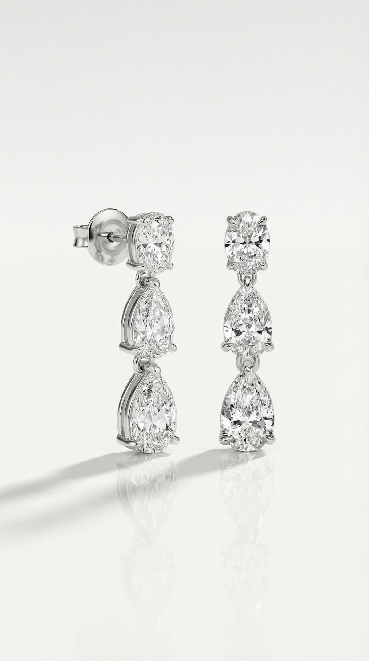 White Gold Pear and Oval Diamond Drop Earrings — Levendi Jewellers