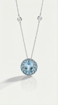 Sky Blue Topaz and Blue Topaz Halo Pendant