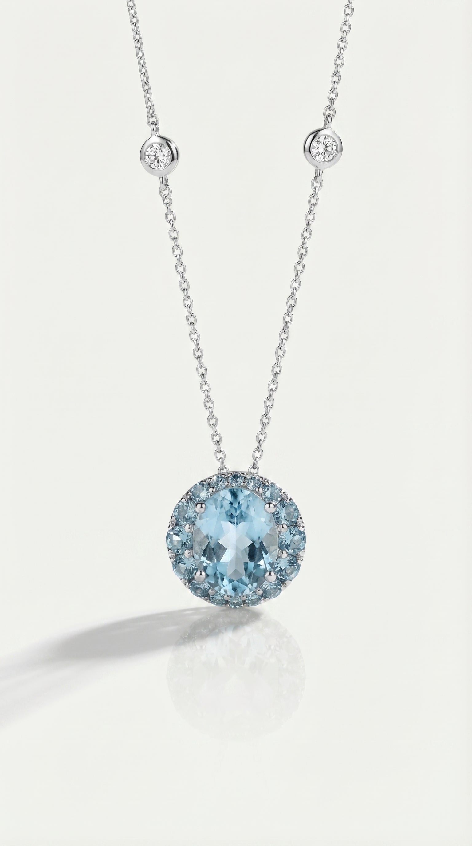 Sky Blue Topaz and Blue Topaz Halo Pendant