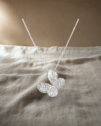 Butterfly Diamond Pendant — styled