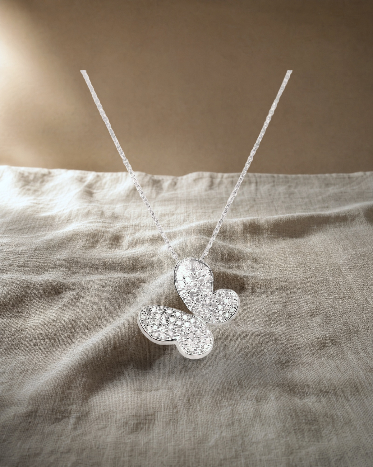 Butterfly Diamond Pendant — styled