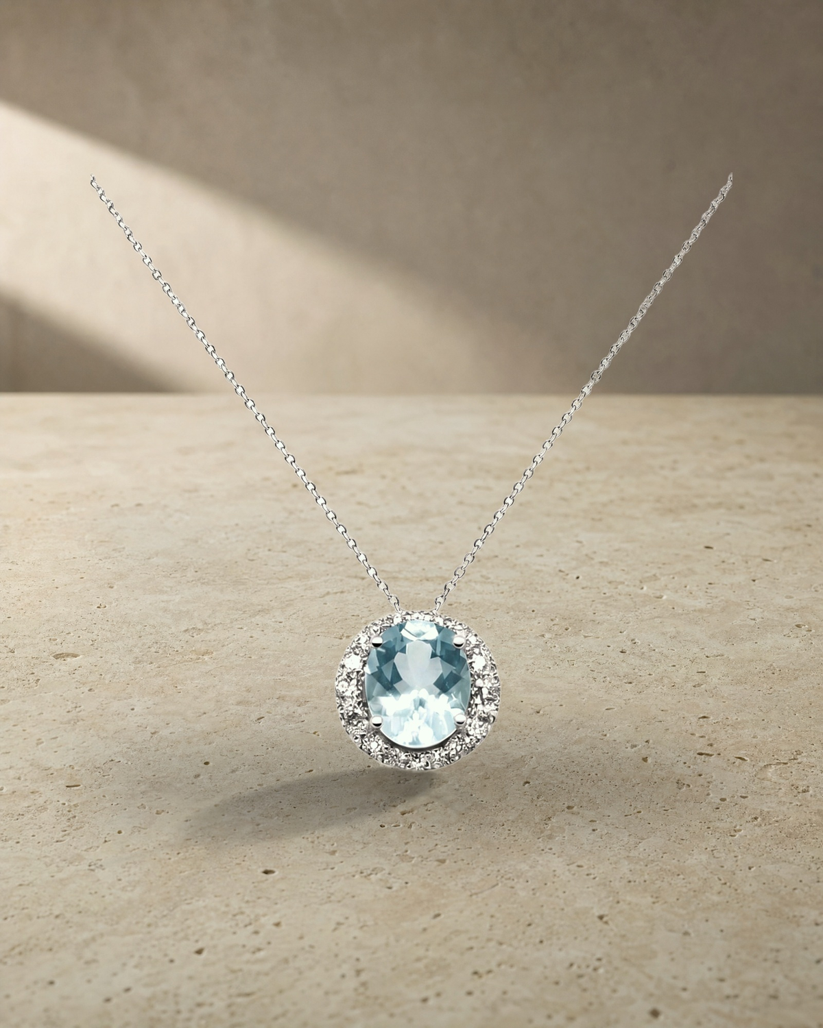 Classic - Aquamarine Halo Pendant — styled