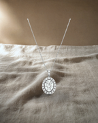 Classic - Oval Halo Diamond Pendant — styled