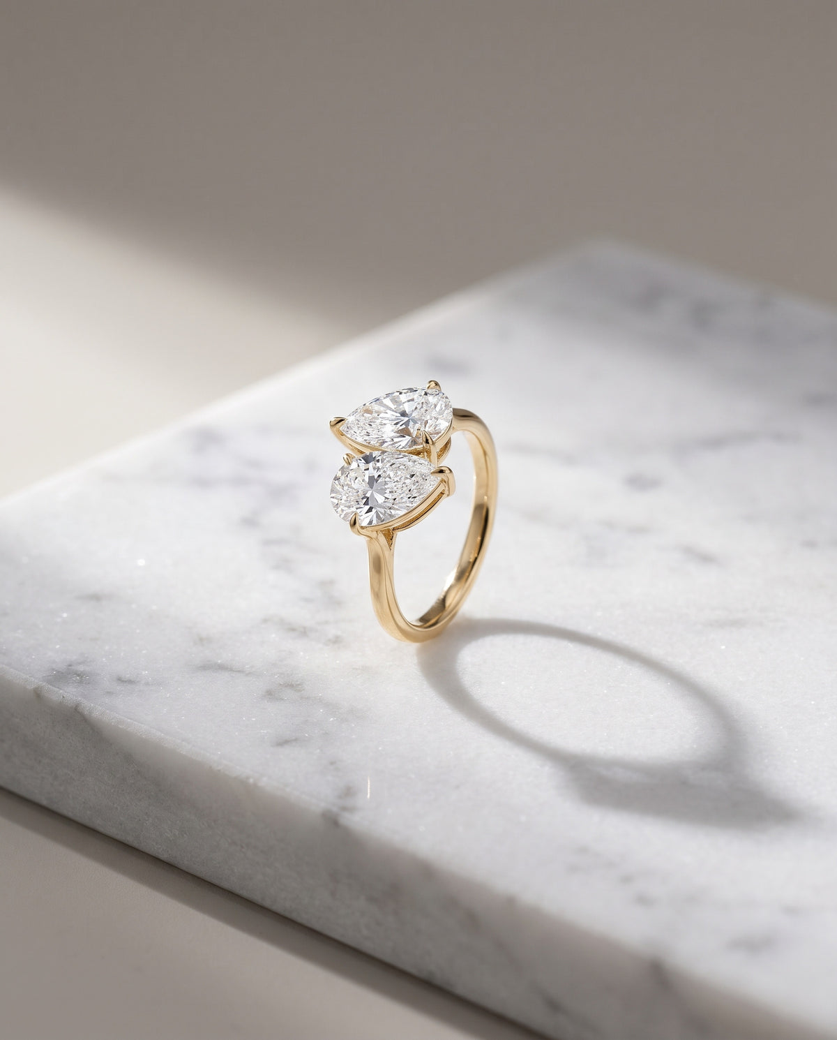Levendi Toi & Moi - Pear cut Twins Engagement Ring — Levendi Jewellers, on stone