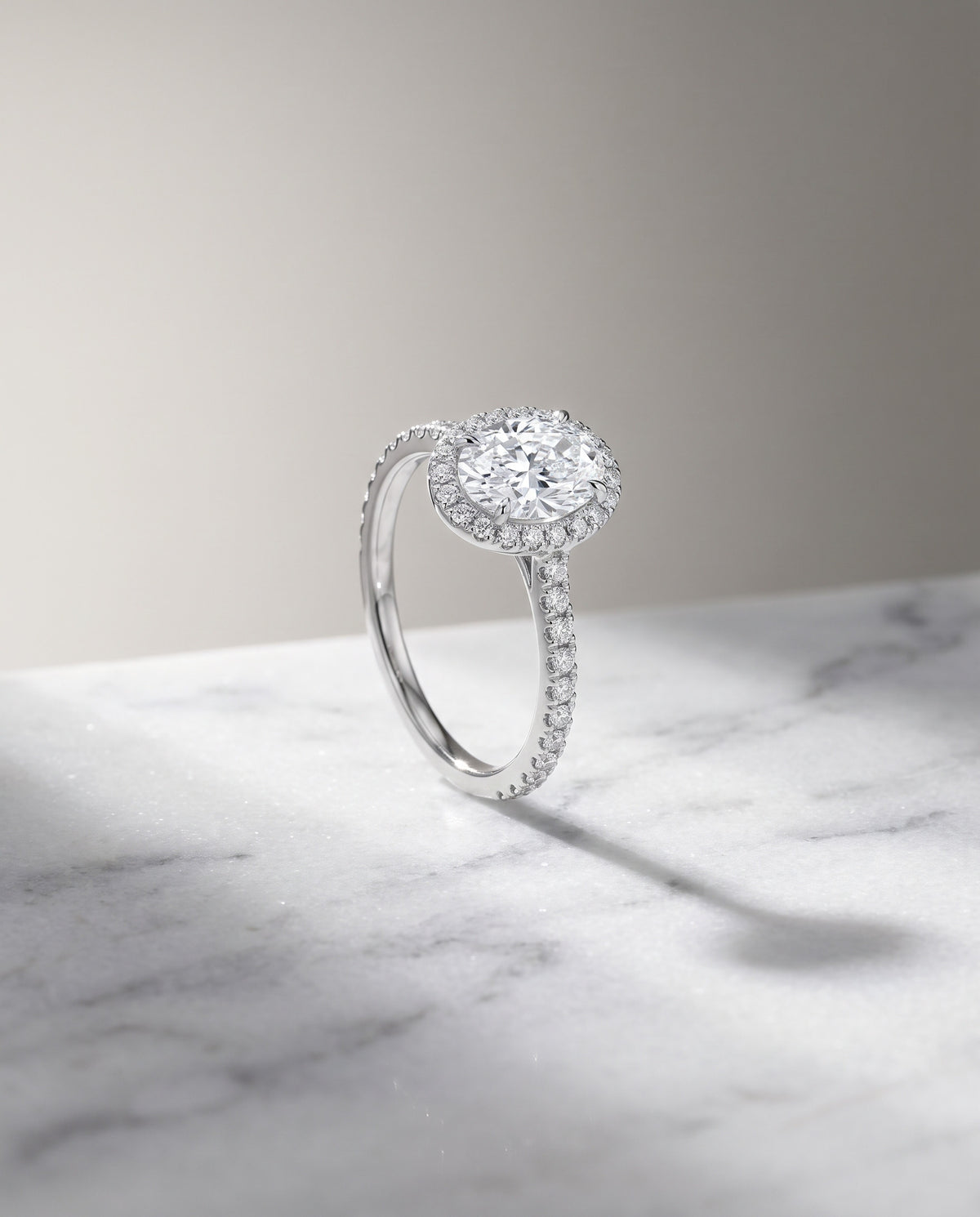 Levendi Signature - Oval Hidden Halo Engagement Ring — Levendi Jewellers, on stone