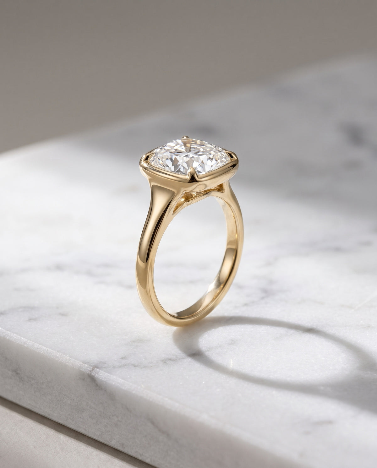 Levendi Wave of Love - Cushion Cut Bezel Engagement Ring — Levendi Jewellers, on stone