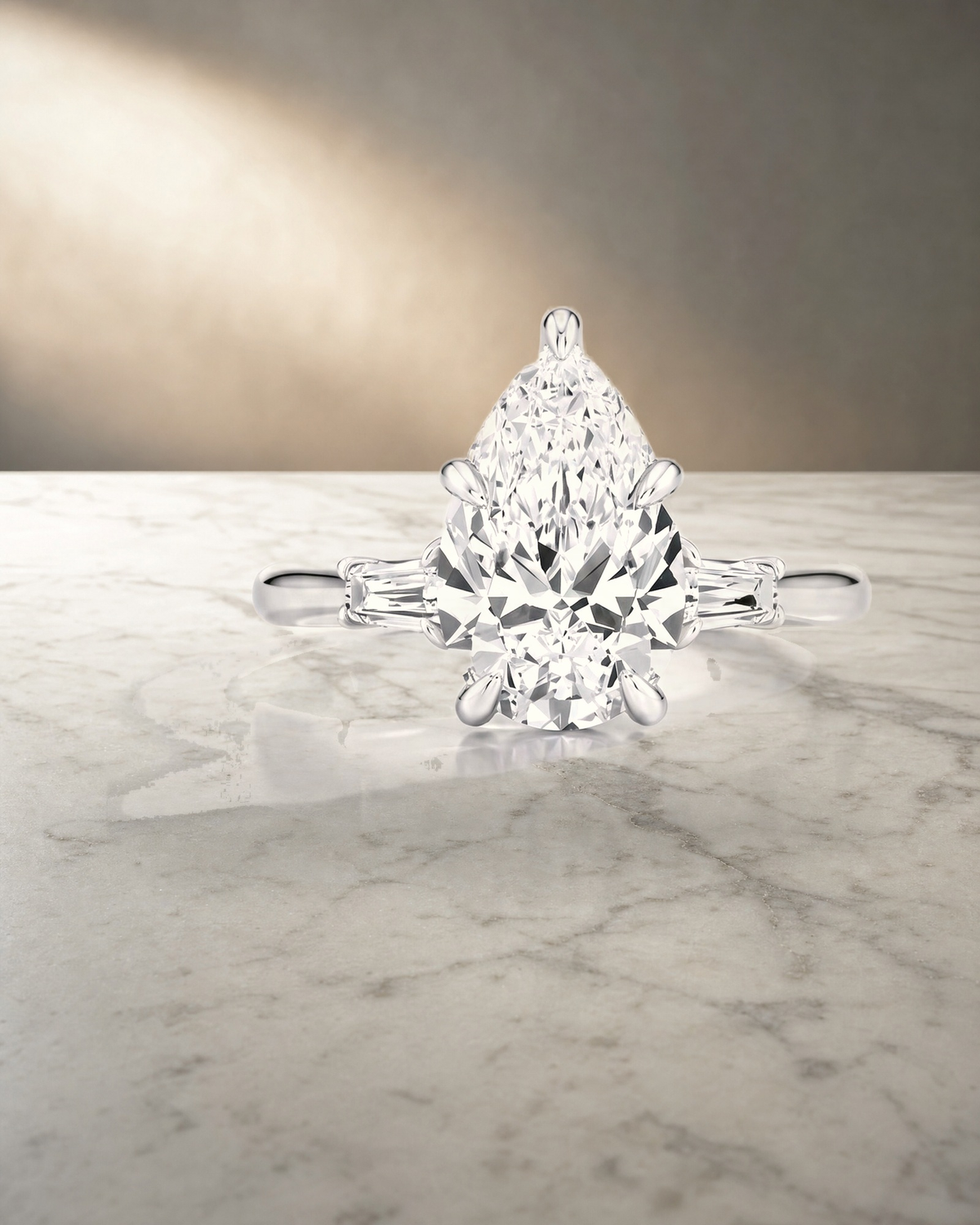 Levendi Classic Trilogy - Pear & Baguette Engagement Ring — styled