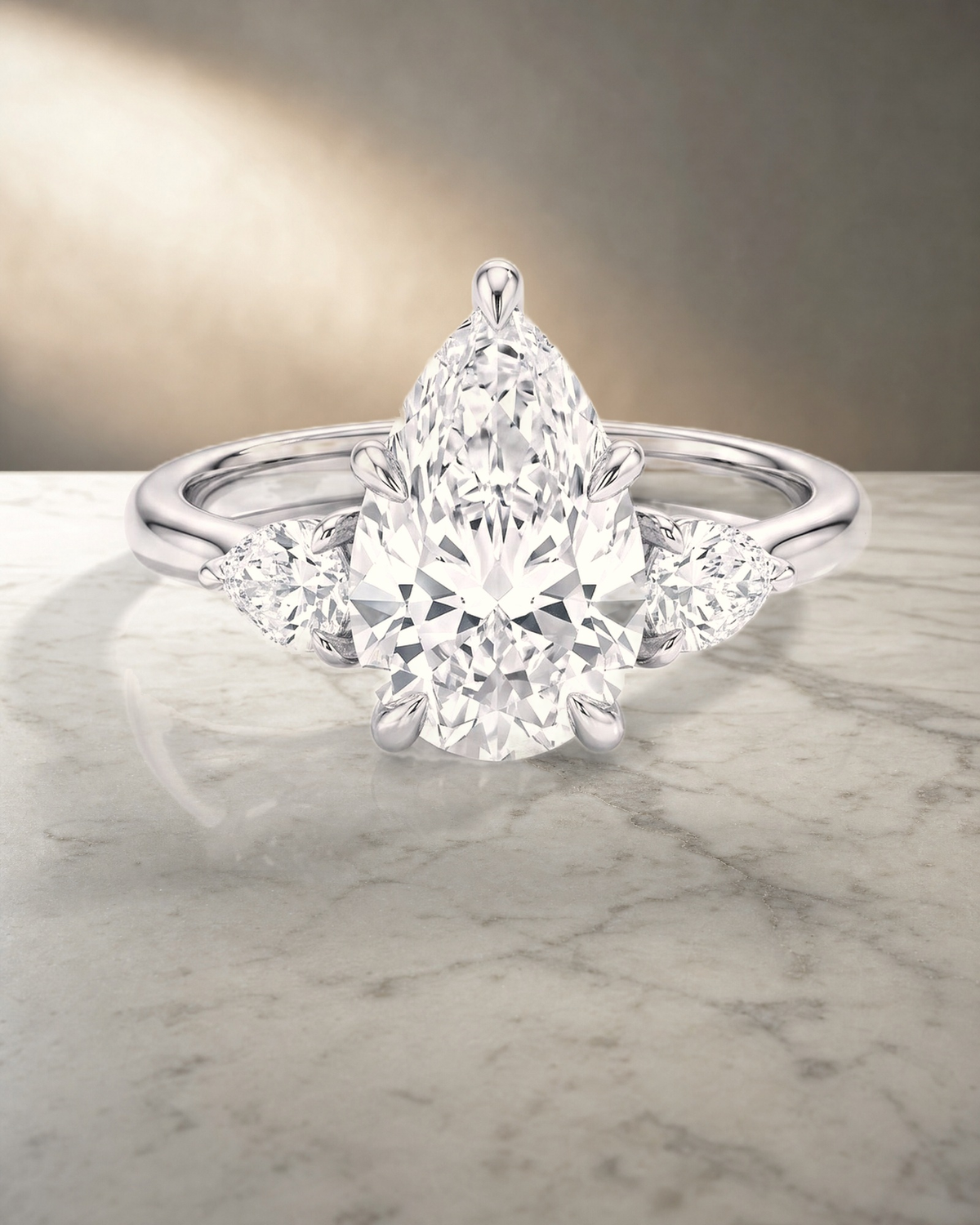 Levendi Classic Trilogy - Pear & Pear Side Engagement Ring — styled