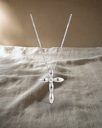 Sophia - Large White Gold Cross and Single Diamond — styled