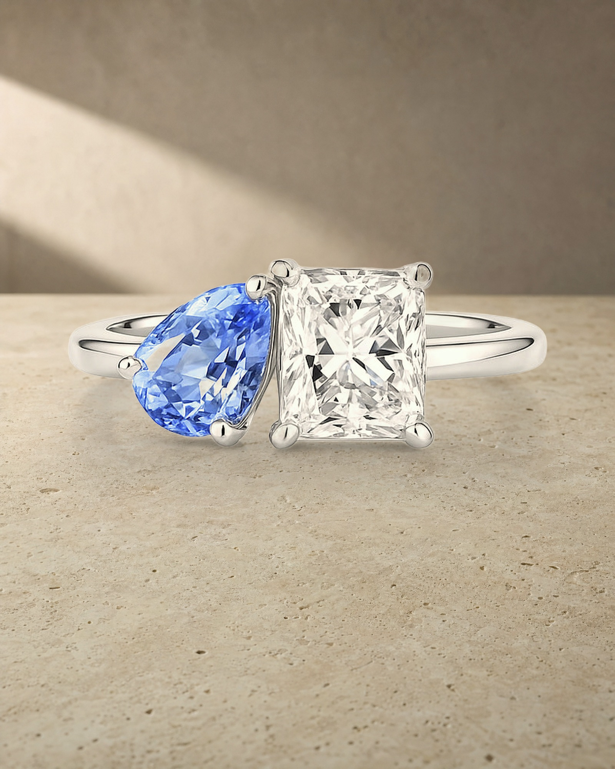 Toi & Moi - Pear and Emerald Cut Diamond — styled