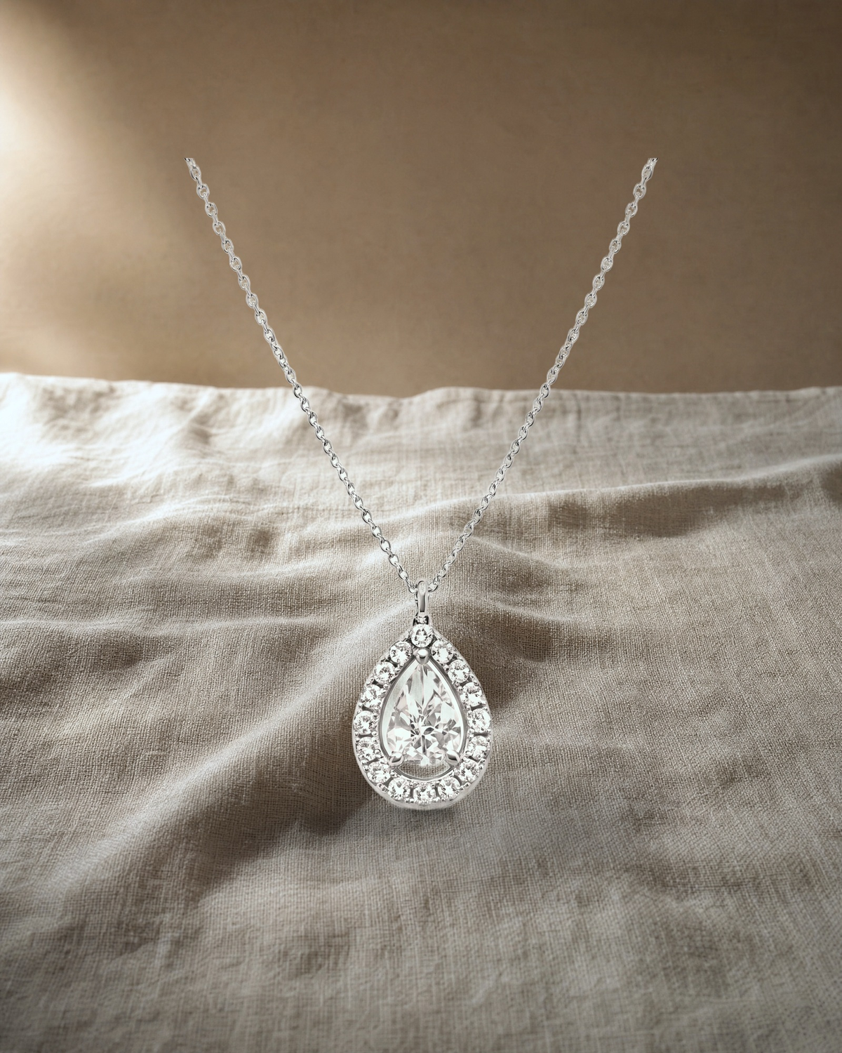 Classic - Pear Halo Diamond Pendant — styled
