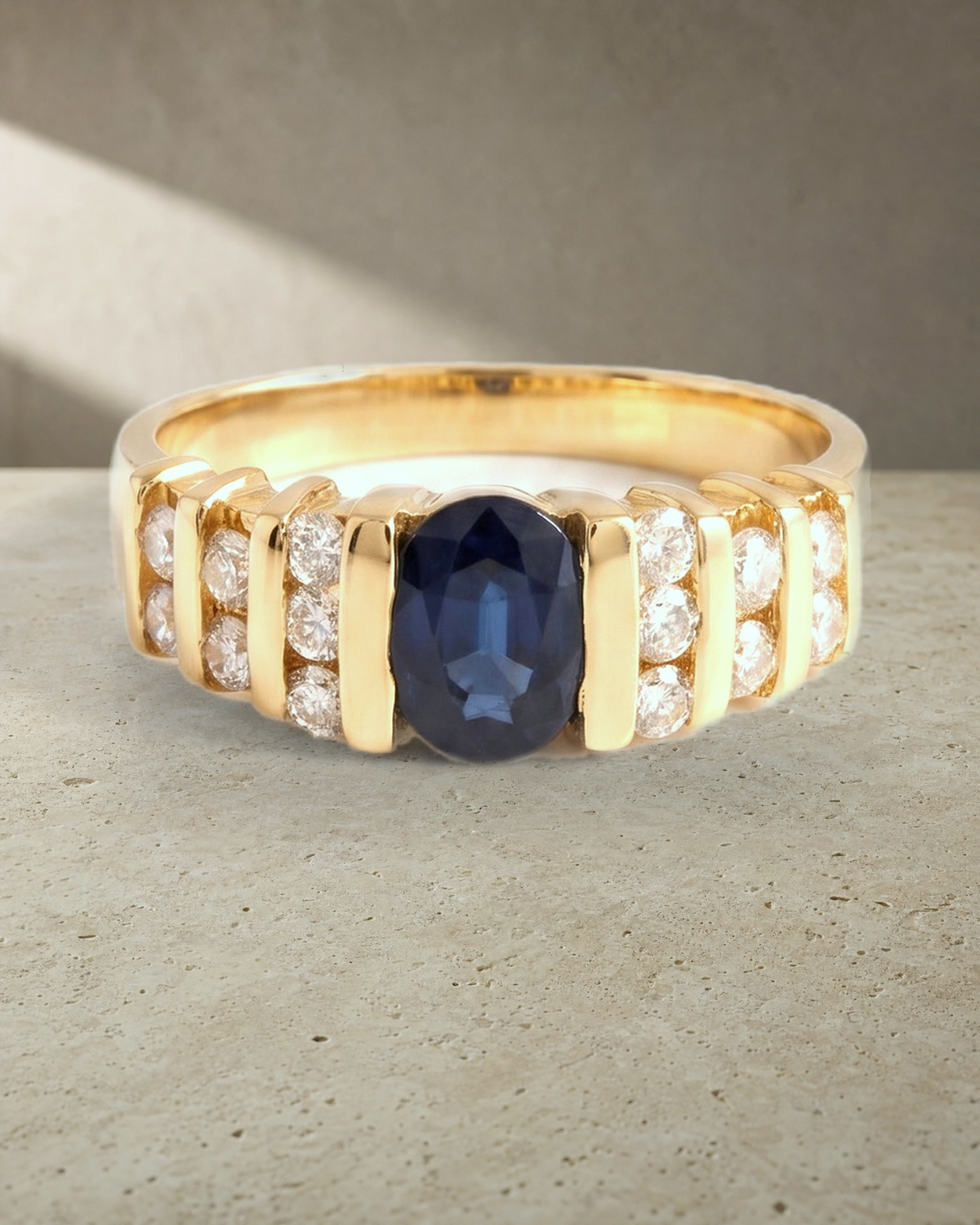 Oval Sapphire Tension Set Signet Ring — styled