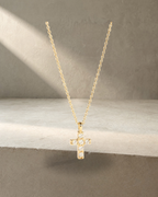 Thea - Mini Yellow Gold Diamonds Cross — styled