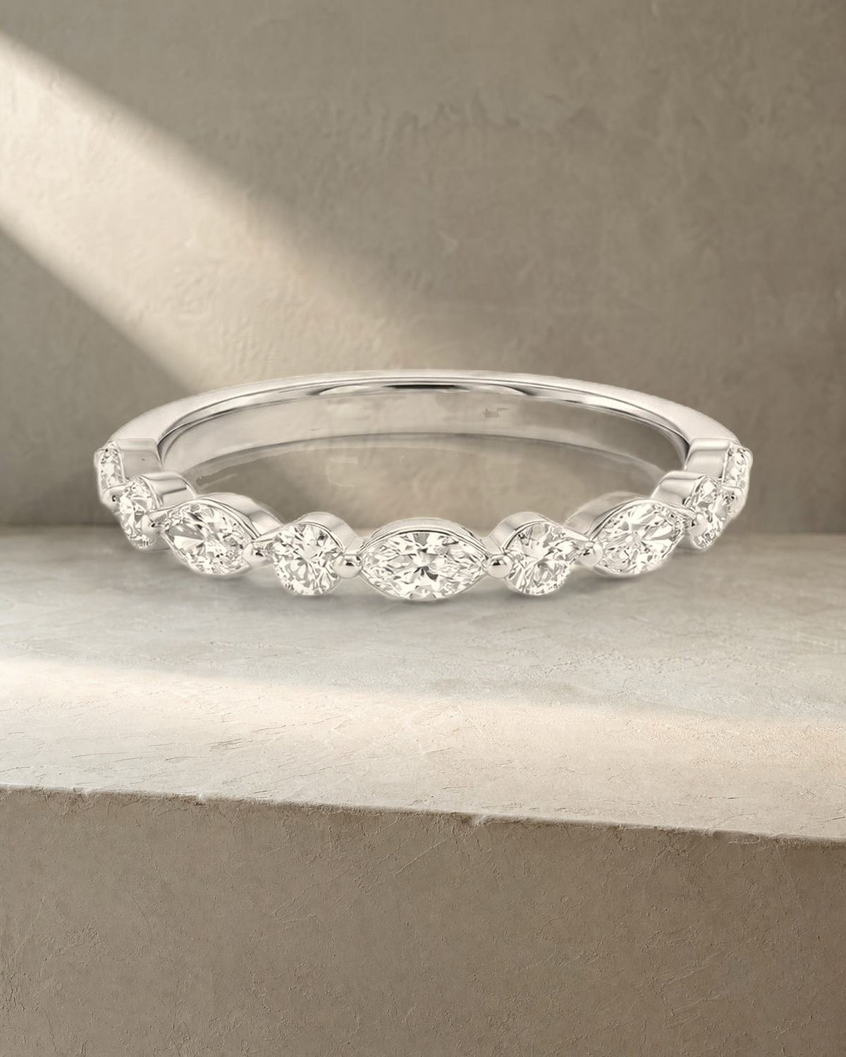 Wedding Band - Marquise and Round Diamonds Shared Claws — styled