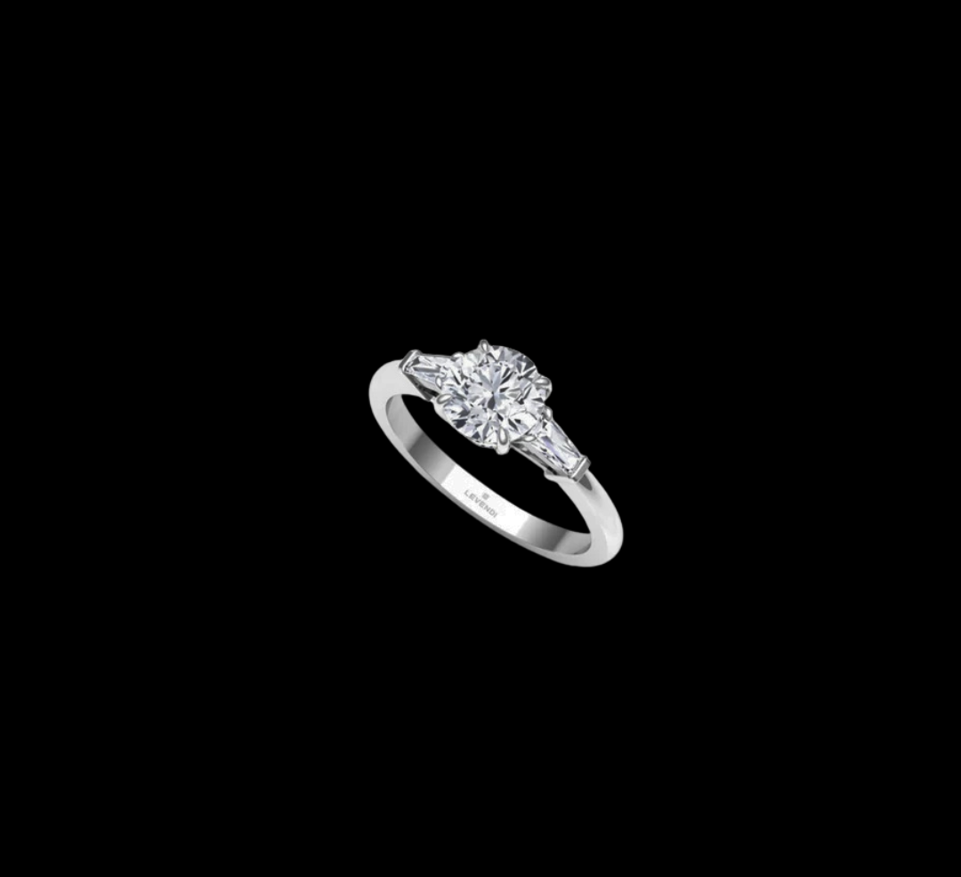 Trilogy Round Brilliant and Tapered Baguette Engagement Ring