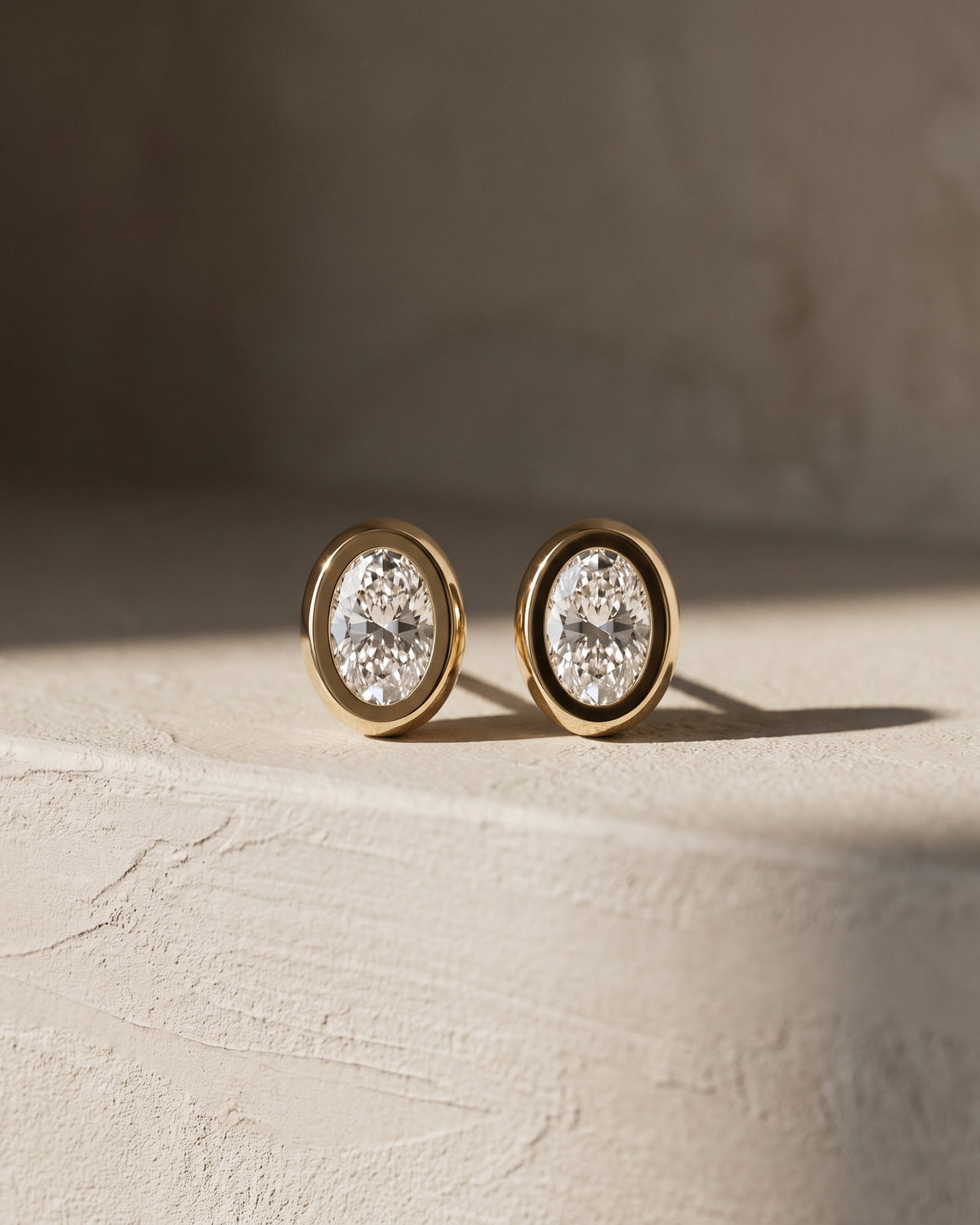 Classic Bezel Oval Cut Diamond Studs Earrings — Levendi Jewellers