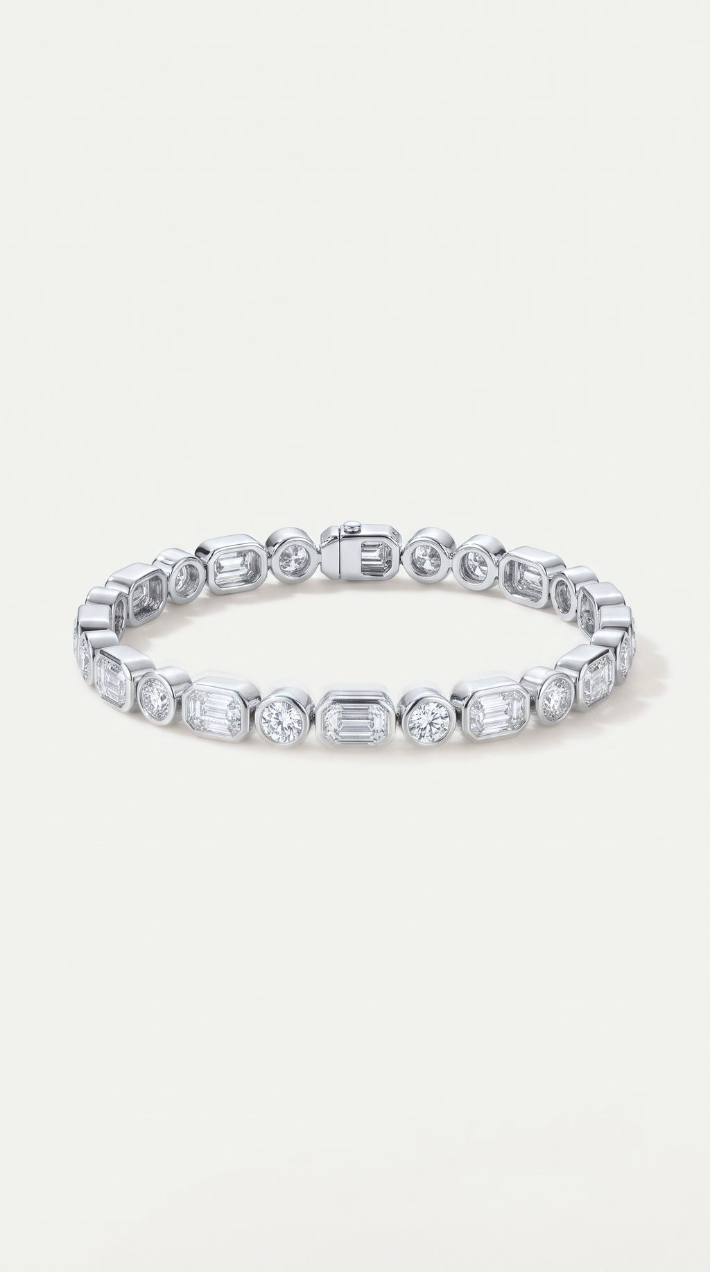 Emerald and Round Brilliant cut diamond  bezel set tennis bracelet — Levendi Jewellers