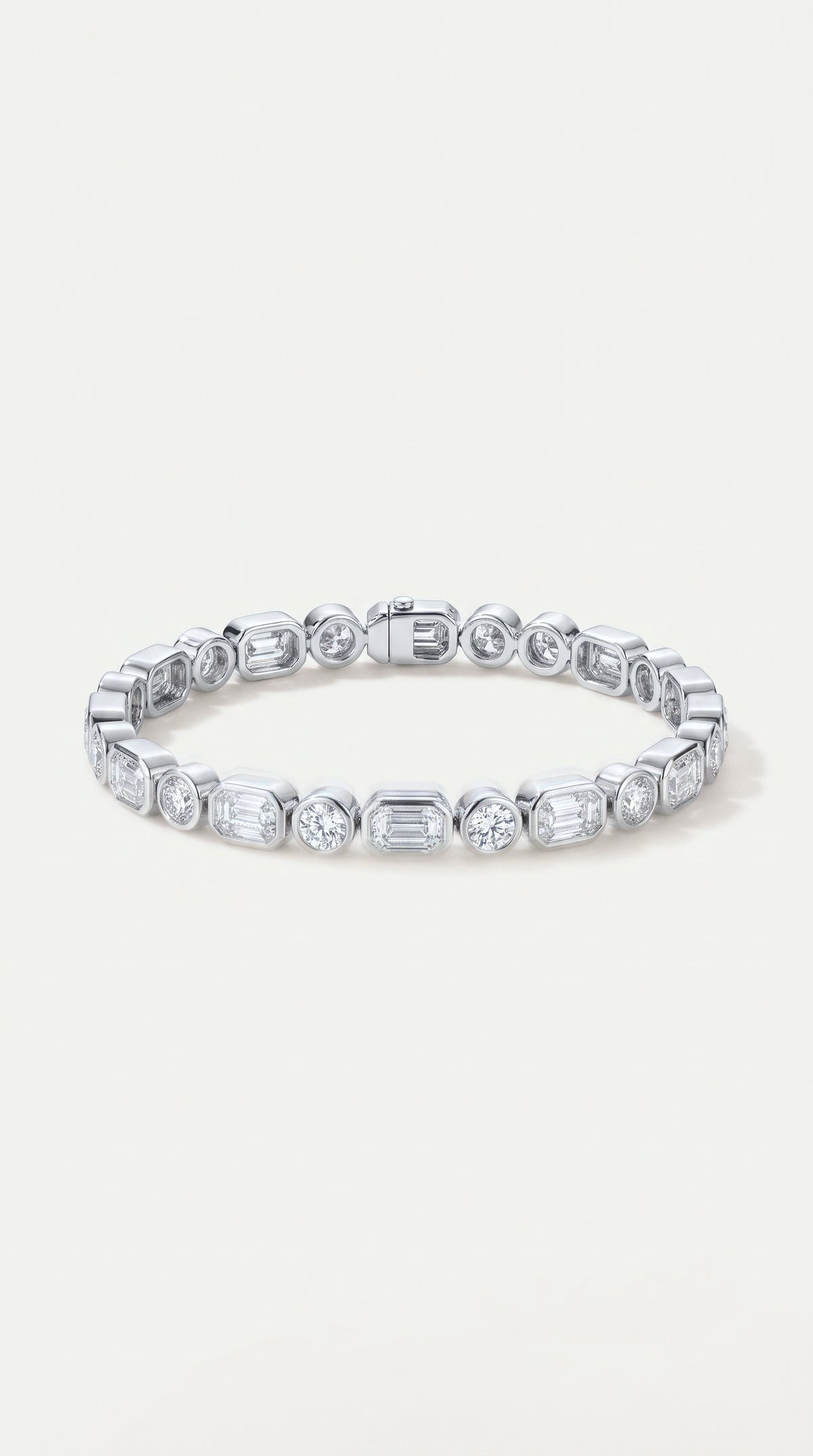 Emerald and Round Brilliant cut diamond  bezel set tennis bracelet — Levendi Jewellers