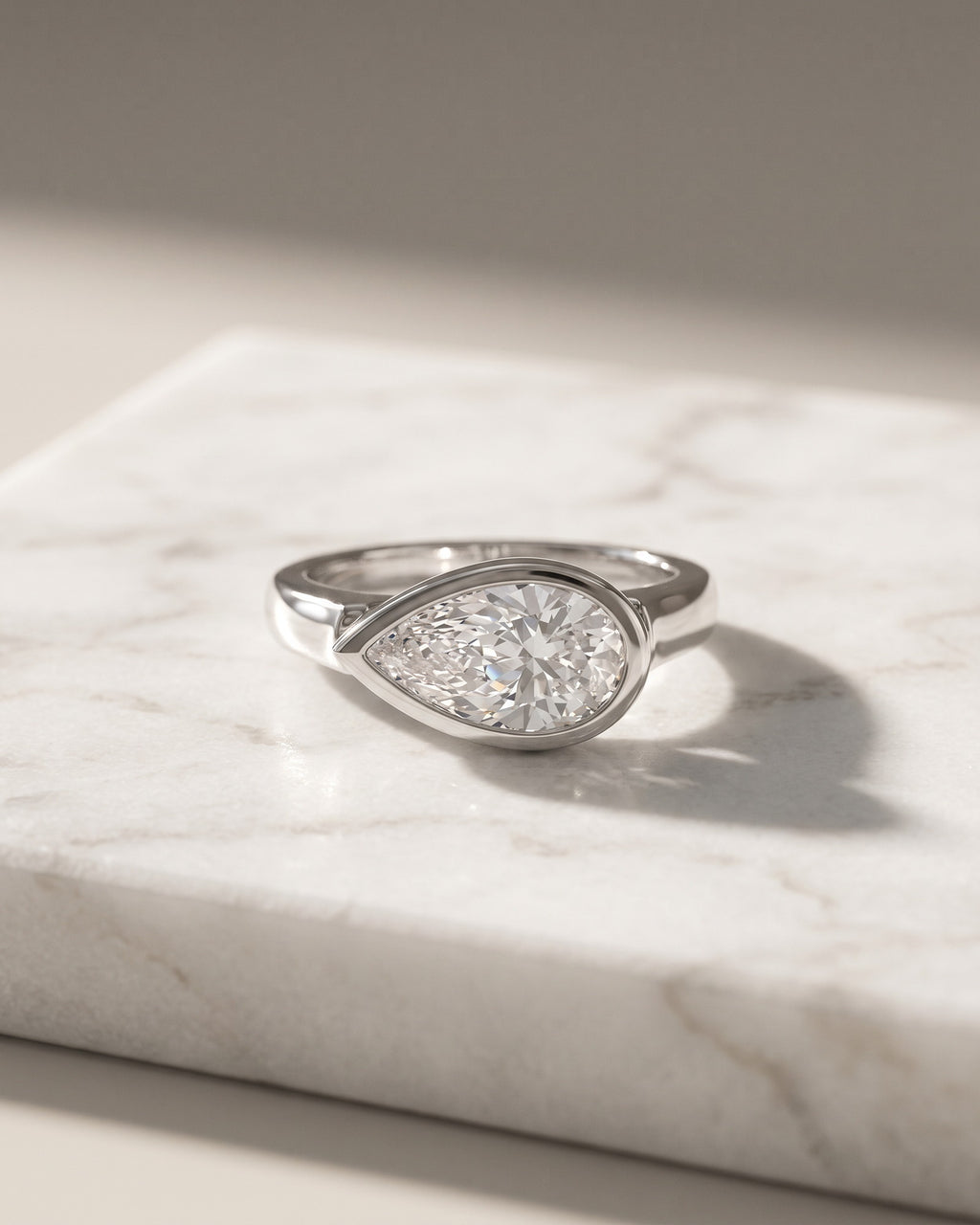 Levendi Wave of Love - East West Pear Cut Bezel Engagement Ring — Levendi Jewellers