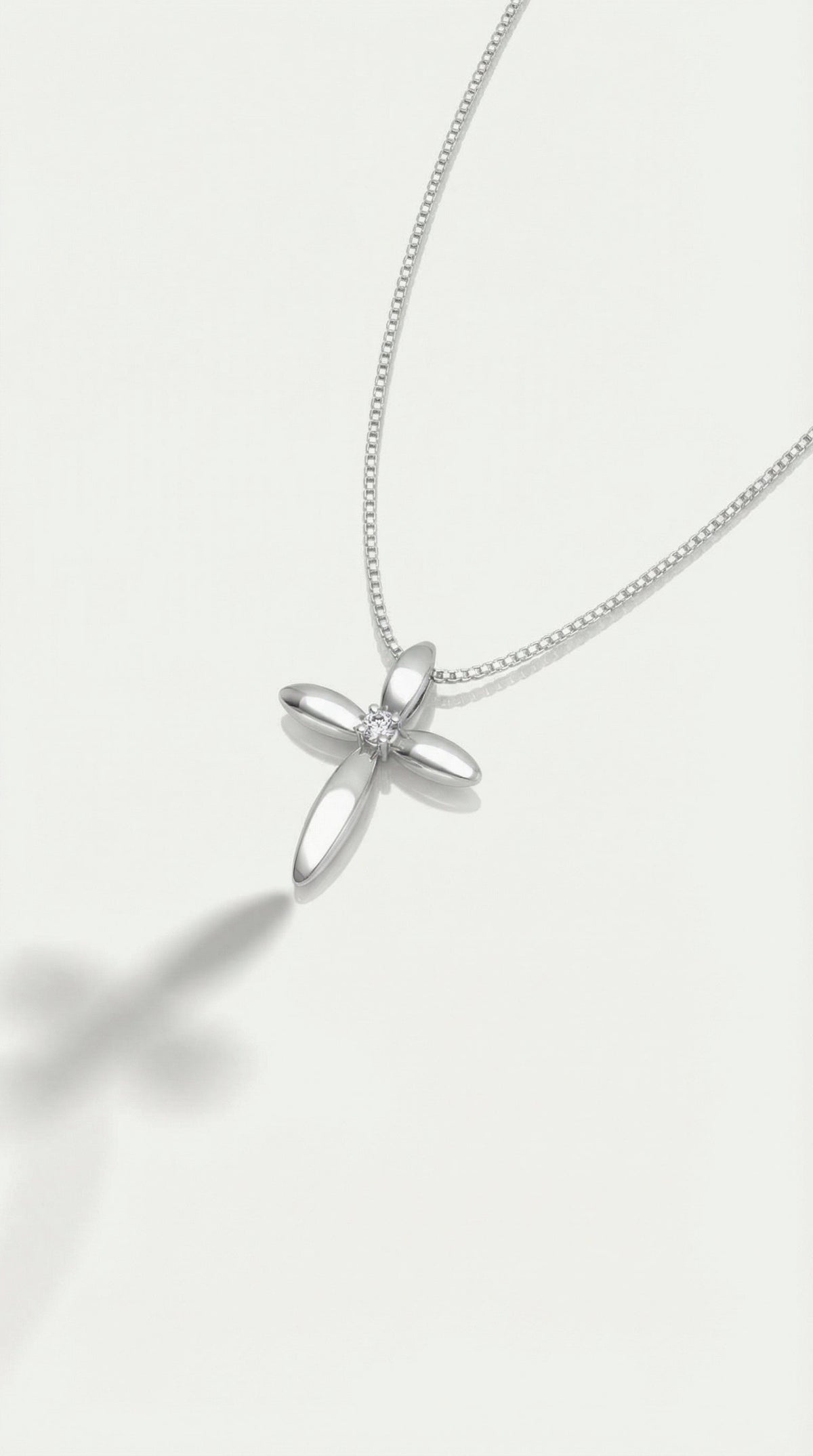 Sophia - Medium White Gold Cross and Single Diamond.