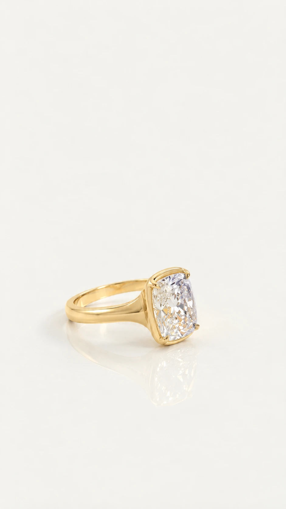 Levendi Wave of Love - Elongated Cushion Cut Four Claw Engagement Ring – side view, yellow gold