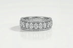 Wide White Gold Oval and Round Diamond.